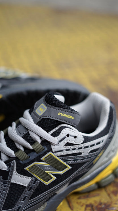 New balance 1906 gris amarilla