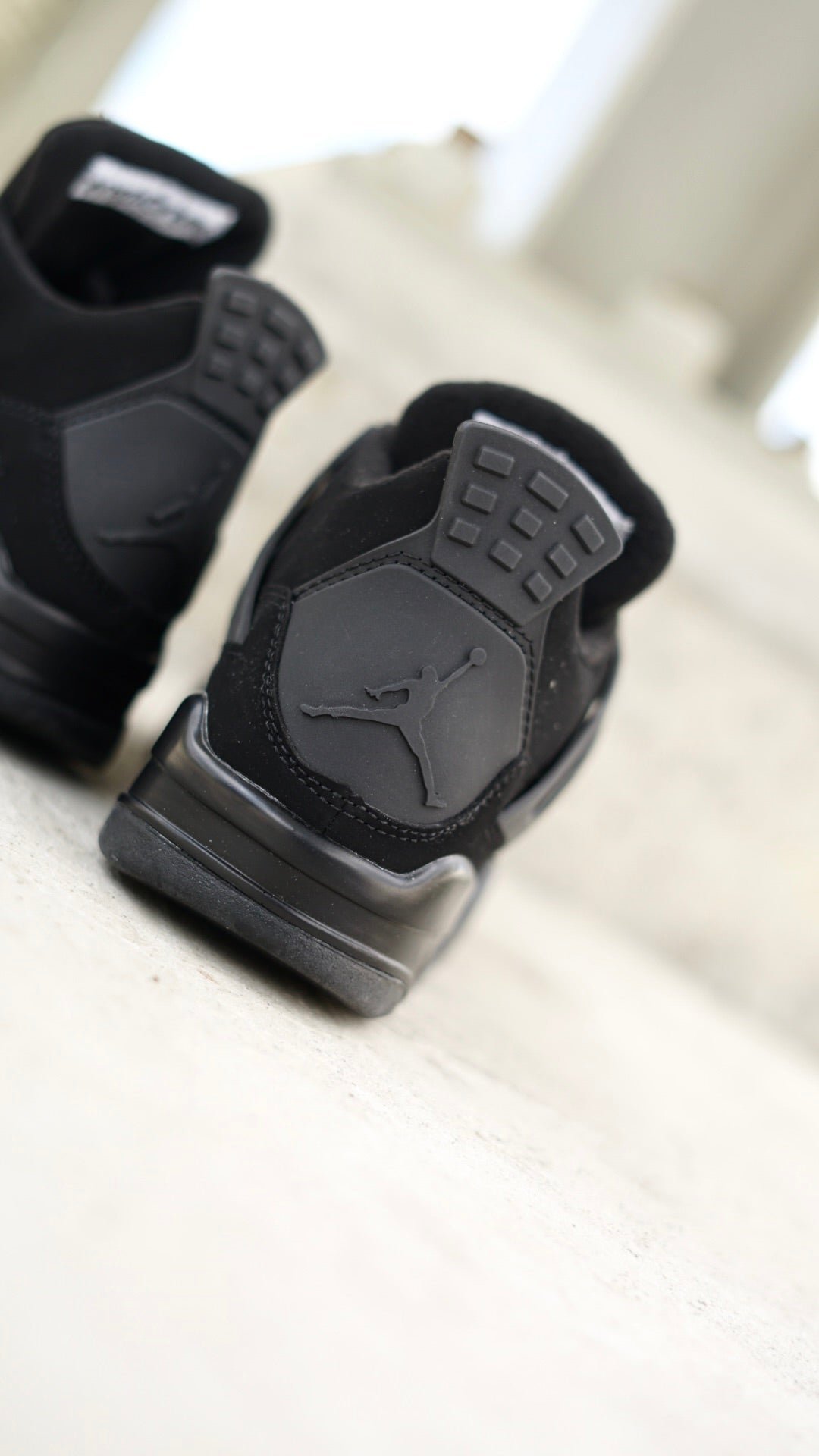 Jordan R4 black cat