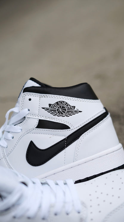 Jordan R1 mid blanco negro